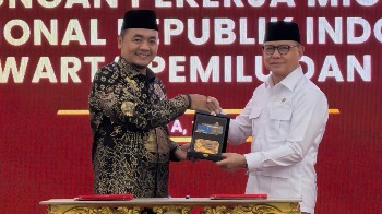 KP2MI dan KPU RI Teken MoU, Pastikan Hak Pilih Pekerja Migran Indonesia di Luar Negeri Terjamin